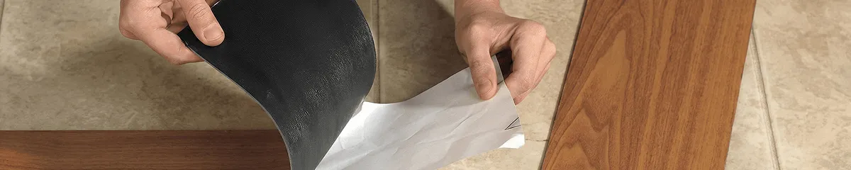 A professional installing vinyl flooring in Boise, ID